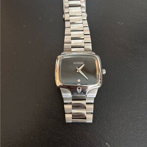 Nixon Metallic Watch with Dark Face